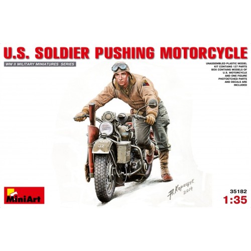 U.S.SOLDIER PUSHING MOTORCYCLE